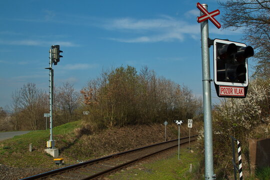 Railway crossing at Nyrsko, Klatovy district, West Bohemia, Czech Republic, Europe. "POZOR VLAK"="Attention Train"
