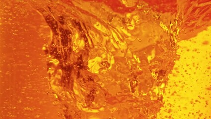 Super Slow Motion Shot of Golden Liquid Vortex at 1000 fps. - Powered by Adobe