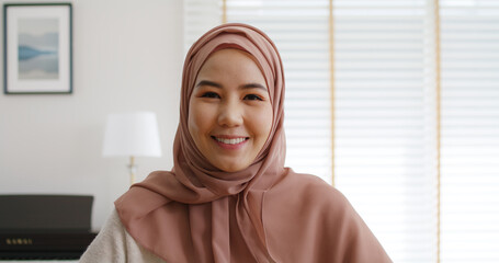 Close-up west asia young arab woman SME owner, MBA student or serene worker wear casual hijab scarf...