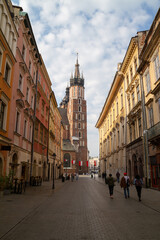 Famous Saint Mary's Basilica (Mariacki Church Kraków) at the Main Market Square in the Old Town district of Krakow, Poland. Seen from the Floriańska street.
