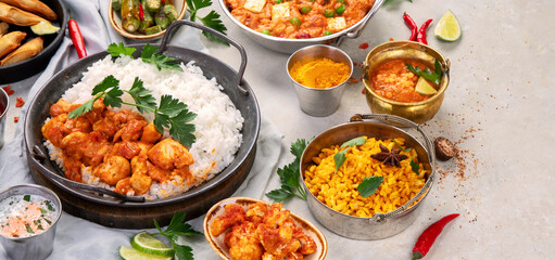 Indian food assortment on light background.