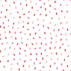 White seamless pattern with pink sprinkles.