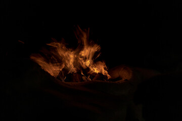 campfire on dark background. Winter