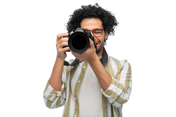 photography, profession and people and concept - happy smiling man or photographer in glasses with digital camera over white background