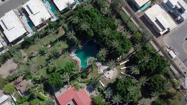 Aerial top down view over luxury home with pool in the backyard in palm springs