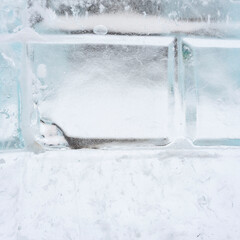 Fototapeta na wymiar ice wall of arctic igloo house. ice brick texture