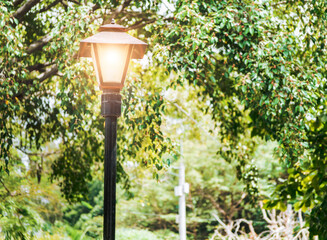 A lantern pole in a square with copy space, An illuminated lantern pole, Public lantern pole, Public lighting pole