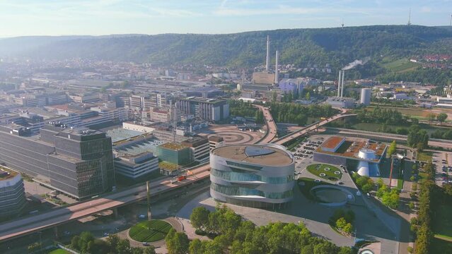 Stuttgart: Aerial view of city in Germany, industrial part of city with factories, sunny day (morning) - landscape panorama of Europe from above