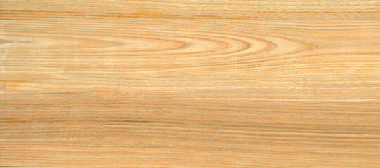 the smooth lacquered surface of the bamboo table.