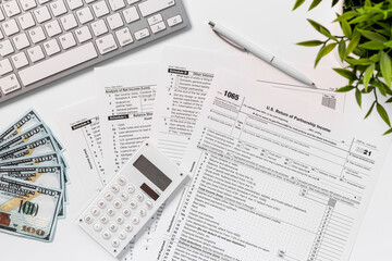 US tax form on businessman office table desktop, top view