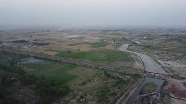 Beautiful aerial landscape at Kala Shah Kako Factory Industrial area of Punjab Pakistan at Sunset Time, drone's footage
