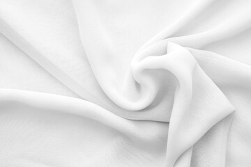 Wavy white chiffon fabric as texture or background, twisted soft transparent cloth