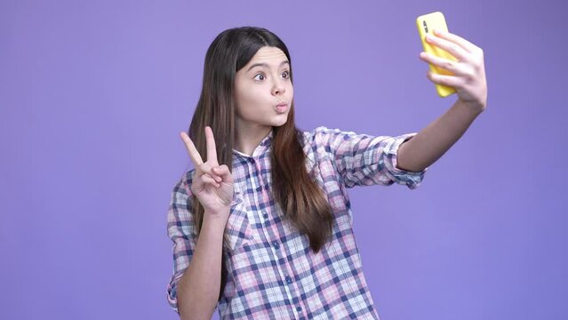 Small little vlogger kid post selfie send sms isolated shine color background