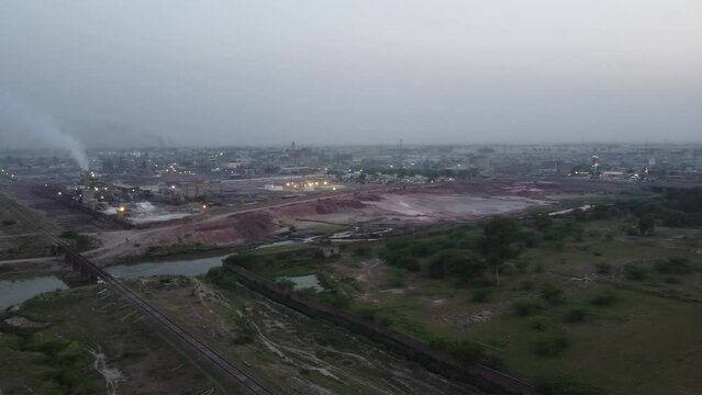 Beautiful aerial landscape at Kala Shah Kako Factory Industrial area of Punjab Pakistan at Sunset Time, drone's footage