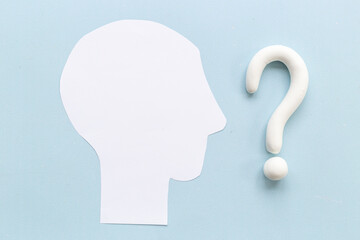 Paper man head with question mark. Solving problem of solution concept