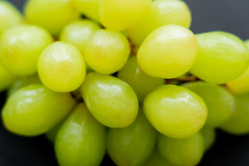 close up of wet and fresh grapes.