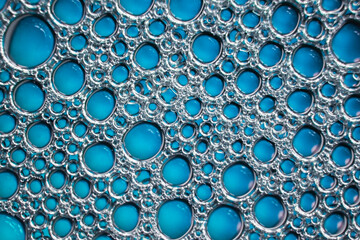 Abstract bubble blue background close up