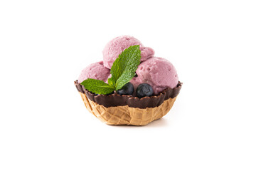 Blueberry ice cream scoop in waffle basket isolated on white background
