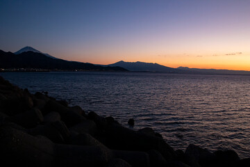 Fuji mountain and sunset over the sea