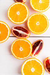 Sliced oranges on white background. Flat lay, top view