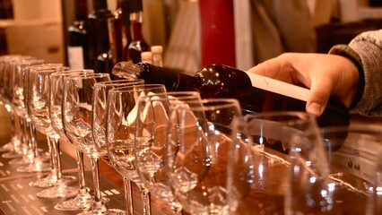 pouring wine into glass