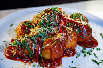 tender polpettes in tomato with herbs