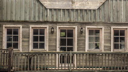 facade with many windows from a house in a western town