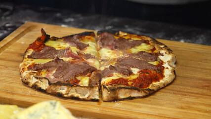 Homemade pizza with meet and cheese