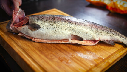 Fresh red fish on cooking board