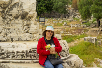 beautiful woman in temple of Apollon, Turkey	