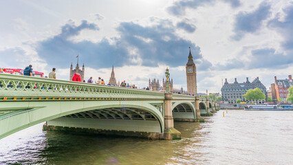 bridge over the river thames to Big Ben in London UK