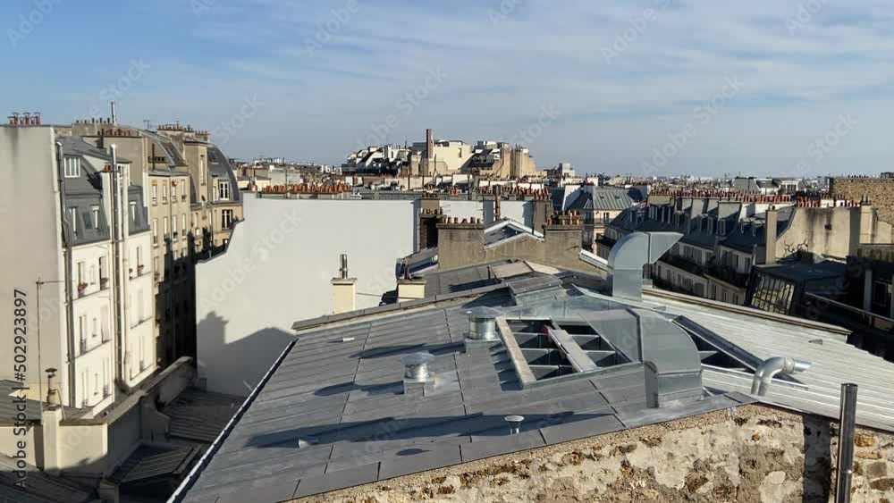 Wall mural Paysage urbain, vue d'un toit d'immeuble à Paris