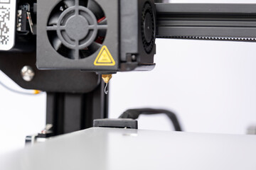 3D printer board, close-up to 3D printer, macro-shot of filament, printing and production concept, industrial machine, technological device, top view, selective focus