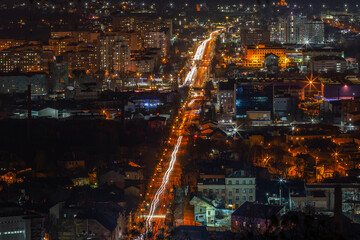 The night city was photographed with a long exposure.