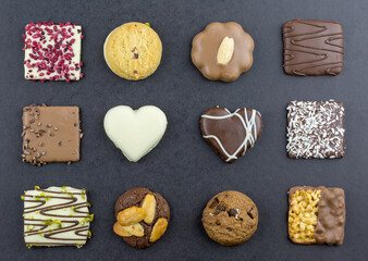 Various cookies on a black background.