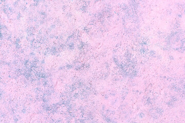 The wall is painted with pink paint and chalk as a background, texture, pattern.