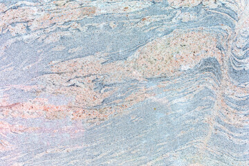 Polished marble surface with an abstract pattern of light gray and beige colors as background, texture, pattern.