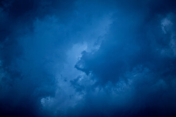 Dramatic deep blue sky during a storm as background, texture, pattern.