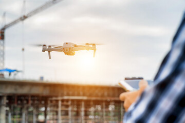 Highway engineers use drones to survey highway construction sites at different levels to check for...