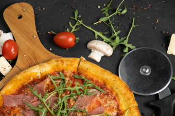 Pizza with prosciutto and cheese. Top view. Free copy space.