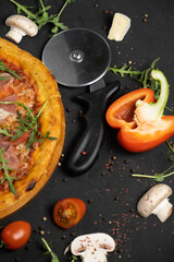 Pizza with prosciutto and cheese. Top view. Free copy space.