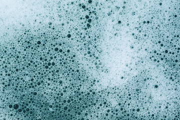 blue foamy water close-up. white bubbles
