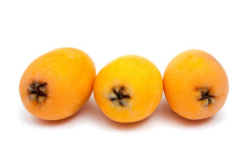 Loquats fruits isolated on white background.