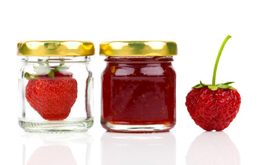 Fototapeta na wymiar Strawberry jam and fresh berries isolated on white