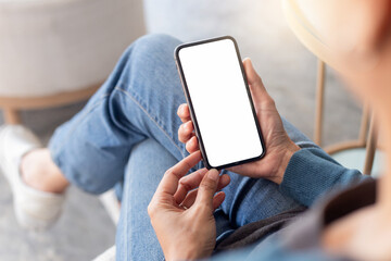cell phone blank white screen mockup.hand holding texting using mobile on desk at office.background empty space for advertise.work people contact marketing business,technology