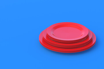 Stack plates on blue background. Copy space. 3d render