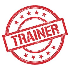 TRAINER text written on red vintage stamp.