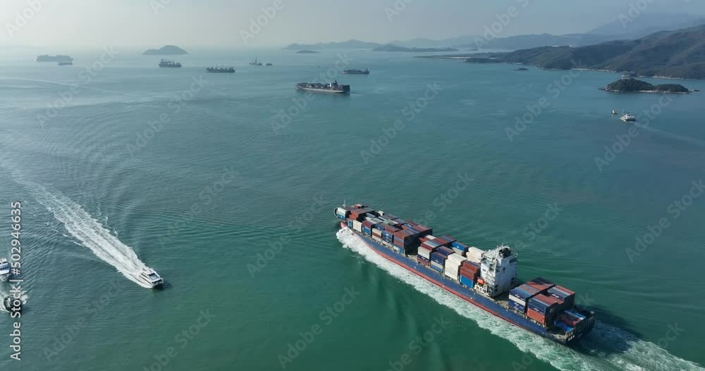 Wall mural drone fly over hong kong cargo ship