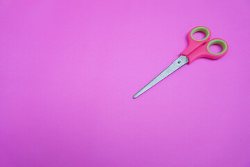 blue scissor isolated on blue