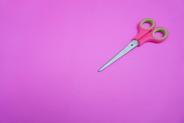 scissor isolated on blue. text space